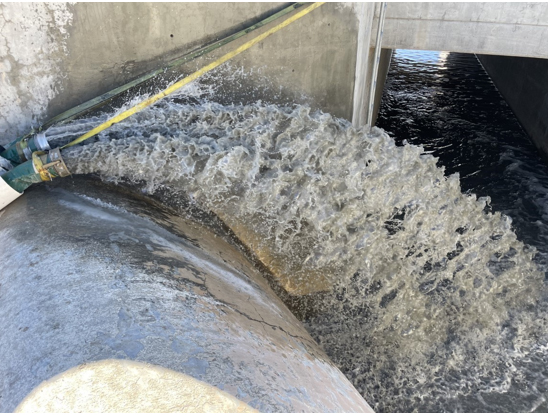 Water Controlled and Flowing Through Spillway